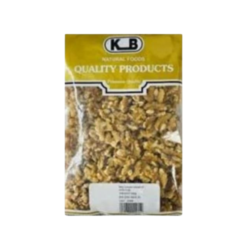 Package of K.B. Natural Foods walnuts on a white background
