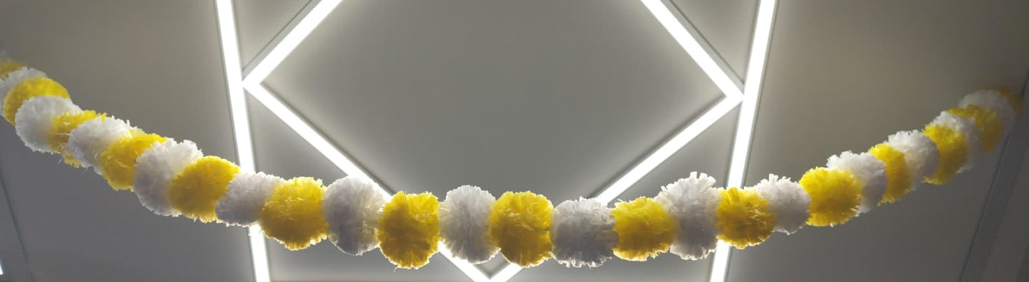 Decorative garland with yellow and white artificial flowers